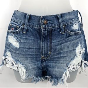 HOLLISTER distressed white floral print shorts 00